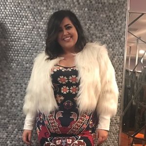 White faux fur coat